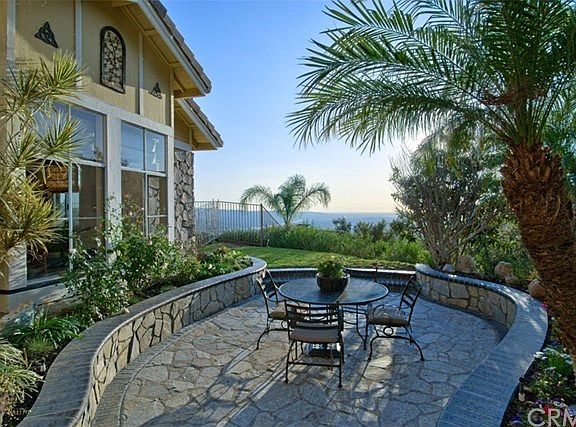 Pretty stone finished view courtyard at entry!