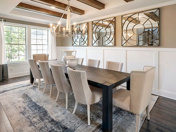 Formal dining room with custom wood beams