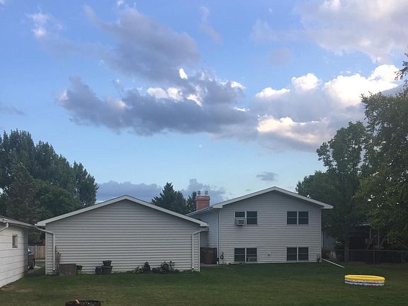 Large backyard with firepit