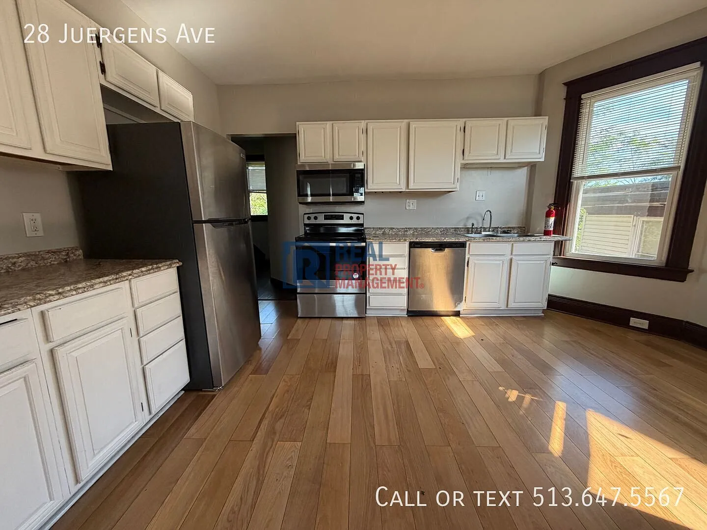 Spacious 5-Bedroom Apartment with Off-Street Parking & Yard! — Photo 4