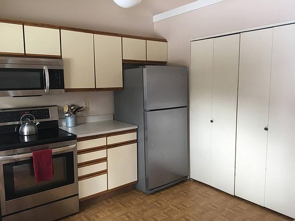 Updated kitchen appliances. Will replace flooring in kitchen/dining/living rooms before we leave.