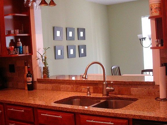 The kitchen overlooks the spacious dining room.