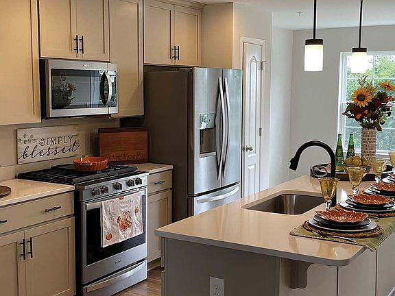 Kitchen with grey cabinets