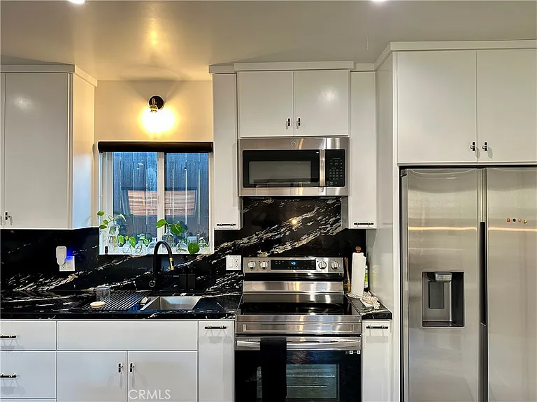 6156 Burwood Ave — Photo 15