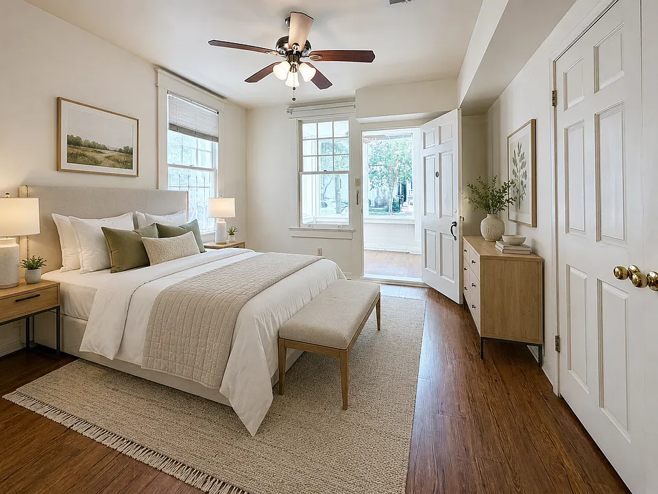 First bedroom with private sunroom, and large closet on the right.
**Photo shows the apartment furnished Apartment is rented unfurnished; furniture and decor are not included.