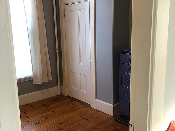 The smaller of the two bedrooms