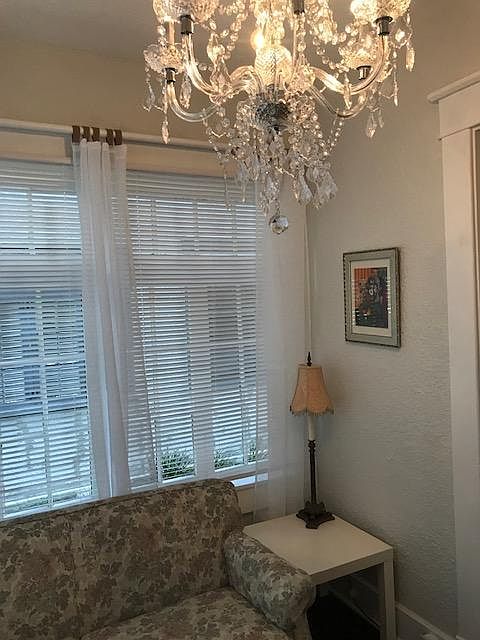 Small hide-a-bed Loveseat, new blinds and white sheer draperies