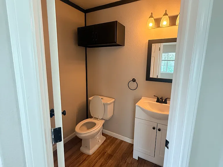 Downstairs half bathroom.