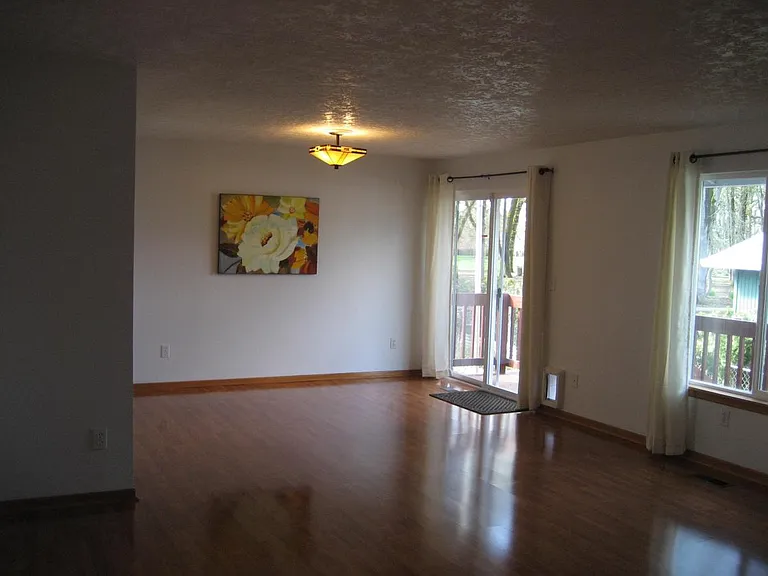 Dining room section leads to back deck and patio