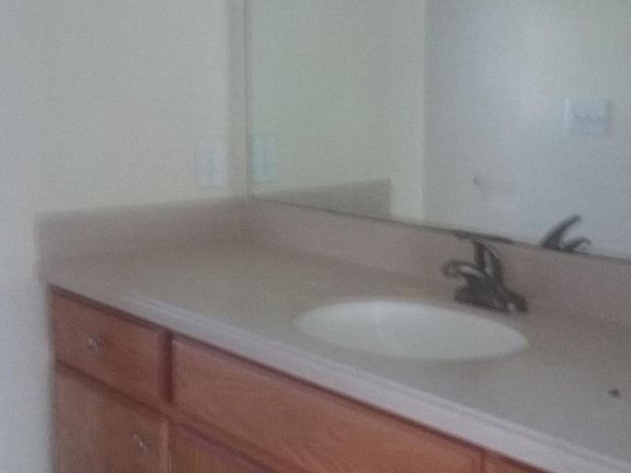 Master Bath with Corian countertop