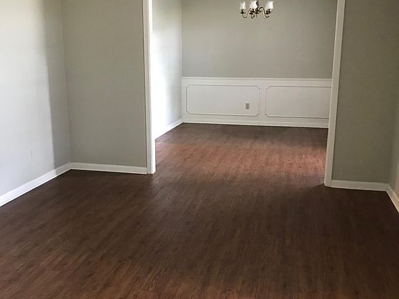 Living room looking into dining room.