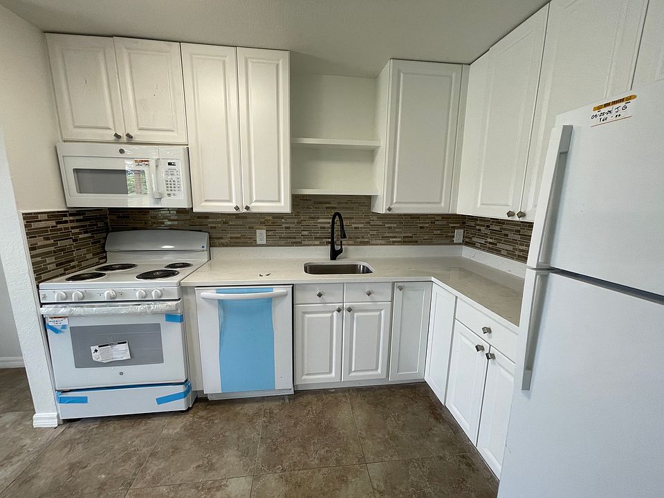 Kitchen is completely renovated with all new appliances, granite countertop, new cabinets and a beautiful backsplash.