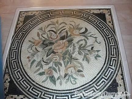 Three Season room with garden garage
						:
						3-season room opens to lovely deck. Under three season room is a storage area.