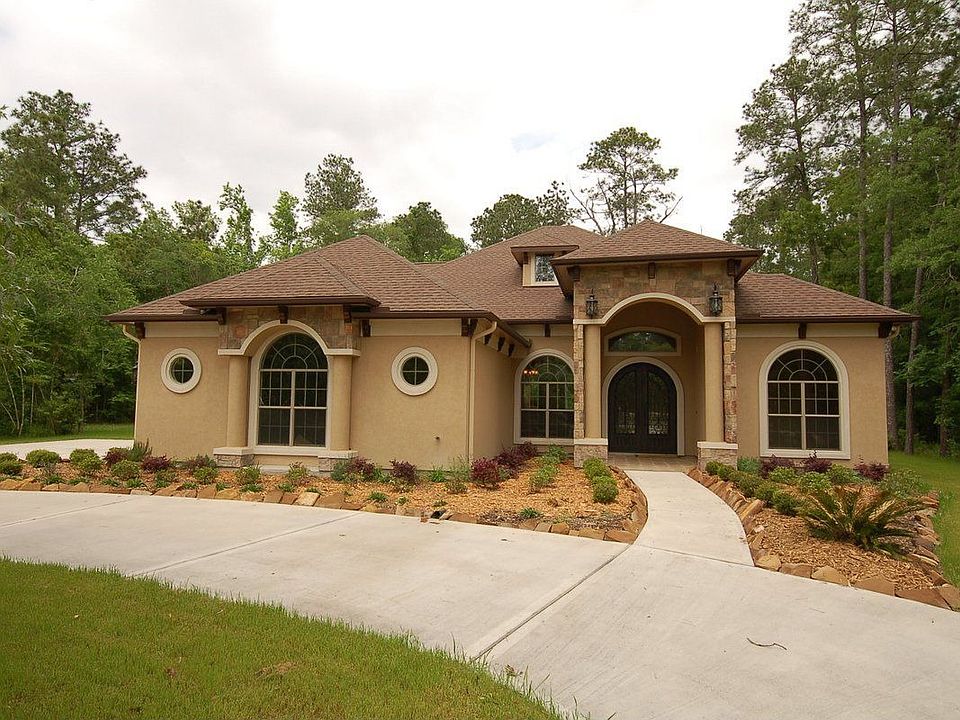 Gorgeous custom built home with pillar accented architecture &amp; decorative 