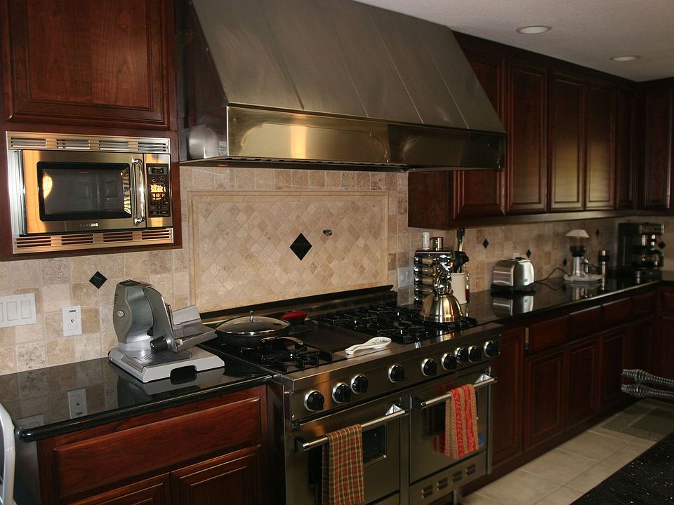 cherry and stainless kitchen