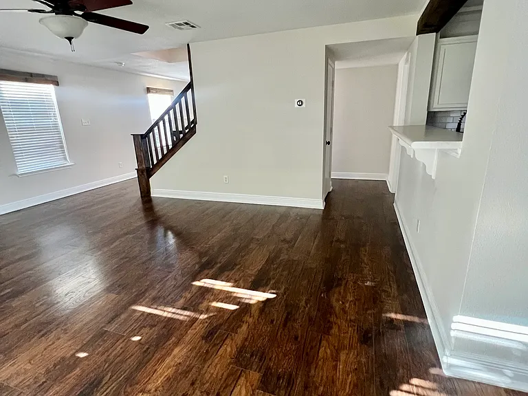 Living room and hallway to downstairs bathroom
