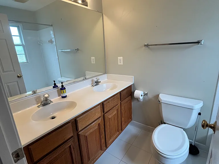 Attached full bath for front-facing bedroom on second floor