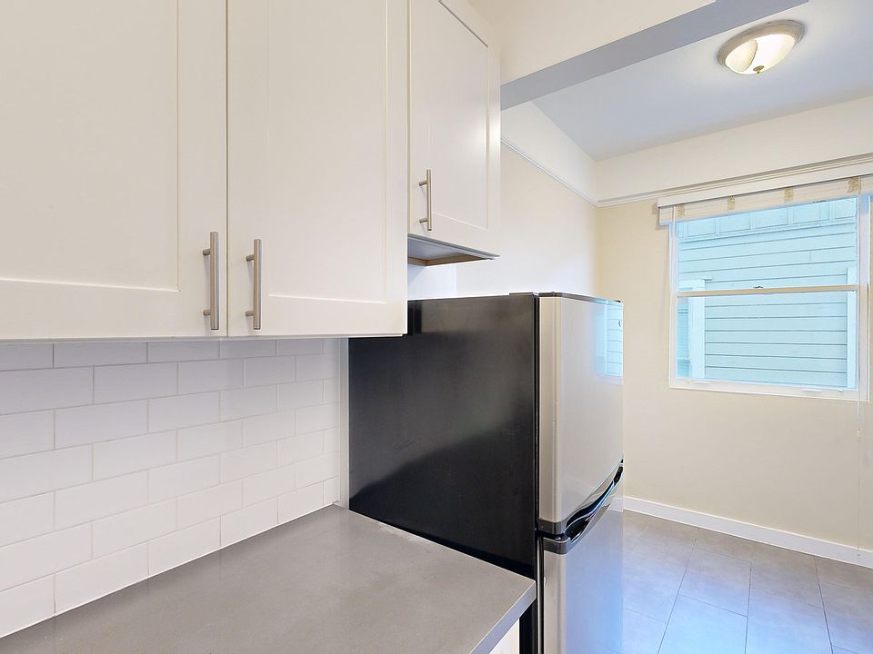 Kitchen with refrigerator