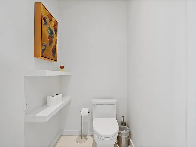 Separate water closet for added privacy.