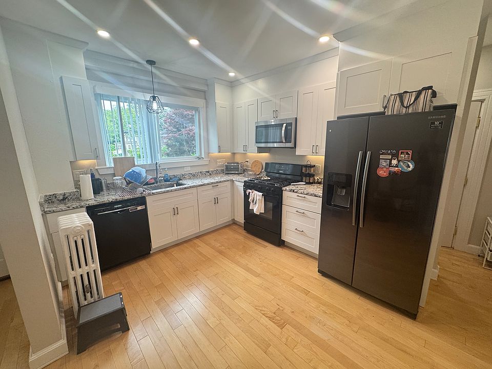 Kitchen gutted & remodeled 2024 with designer cabinetry and granite counters. Large stainless steel sink. Ice maker.