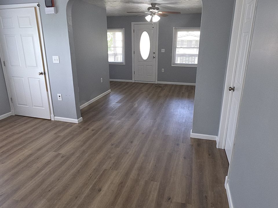 Ding and living rooms lead to the private upper porch