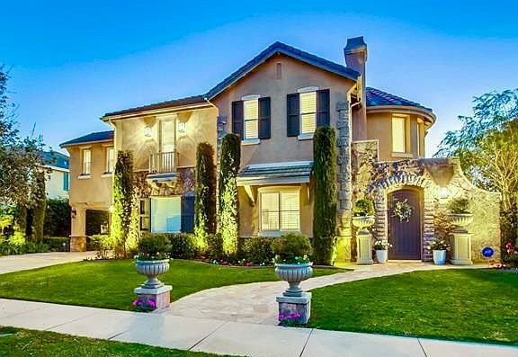 Evening view of this stunning Encinitas Ranch Home on the 11th fairway