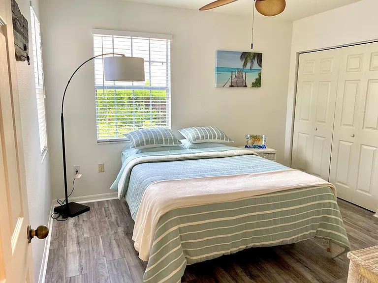 Guest bedroom is on opposite side of condo