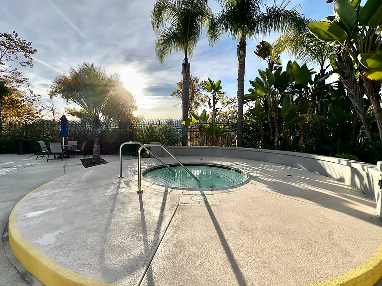 Hot tub in community pool area.