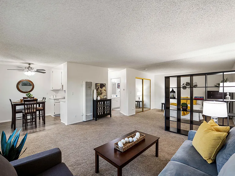 This spacious junior one-bedroom apartment is thoughtfully designed for an open, airy feel, with a clever room divider separating your living and sleeping areas.