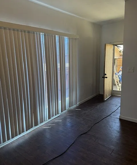 Kitchen nook & hallway leading to backyard