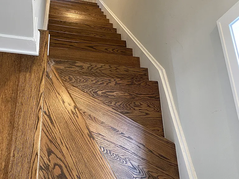 In-unit stairs leading to front entrance