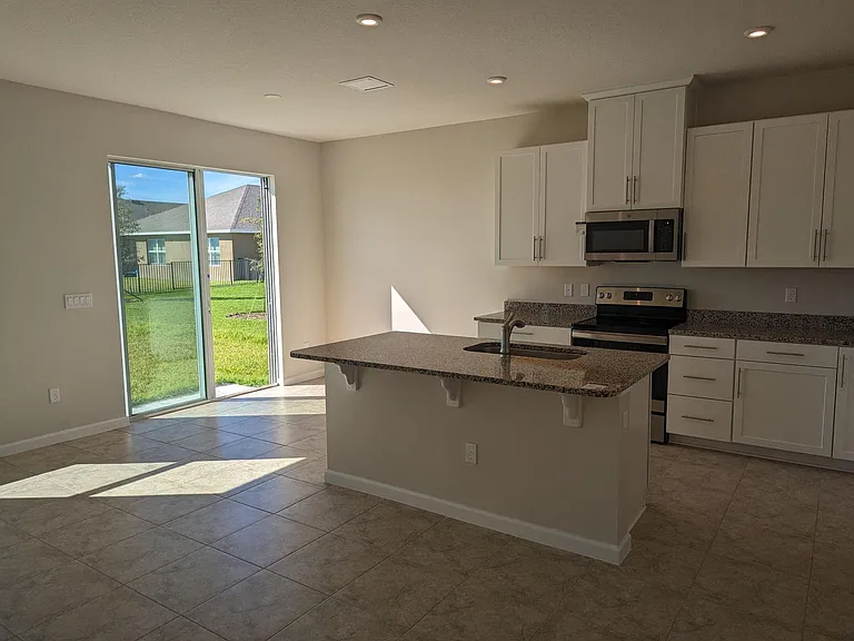 10644 SW Vasari Way — Photo 29