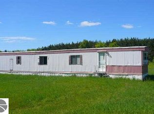 8443 Twin Lake Rd, Mancelona, MI 49659