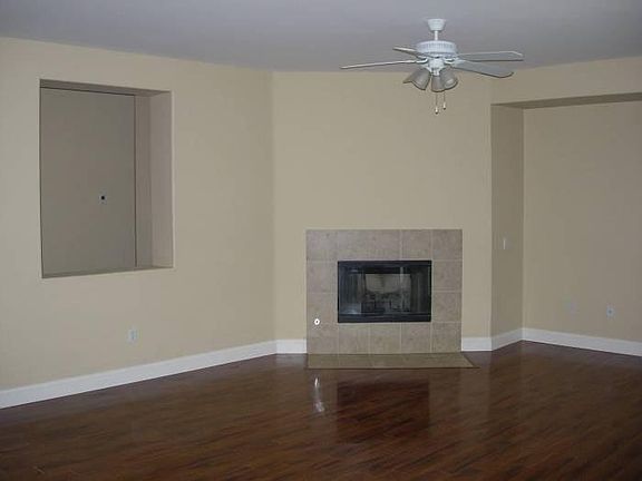 This spacious living room with fireplace.