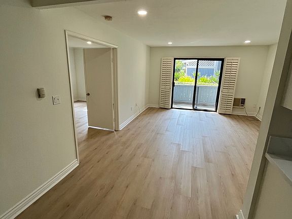 New flooring and shutters entire condo painted