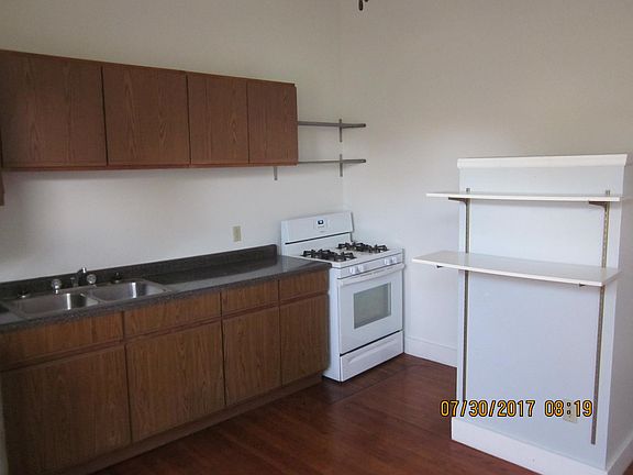 184 Summit Ave apartment five Kitchen cabinets and gas stove