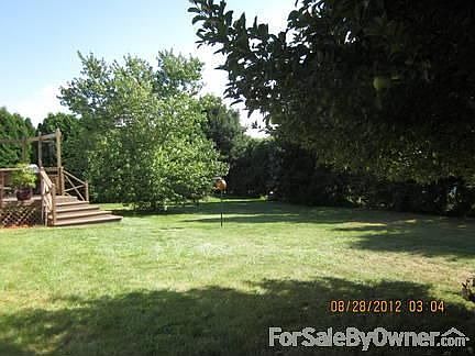 Back yard surrounded by mature trees
						:
						Invisible fencing (in back only), oversized lot with lots of privacy
