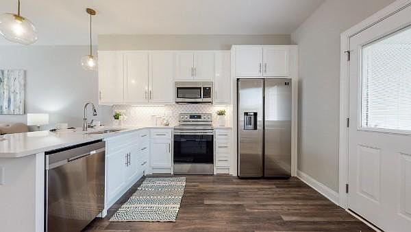 Kitchen equipped with all 4 appliances: Fridge, Range, Dishwasher, Microwave. And has Garbage Disposal