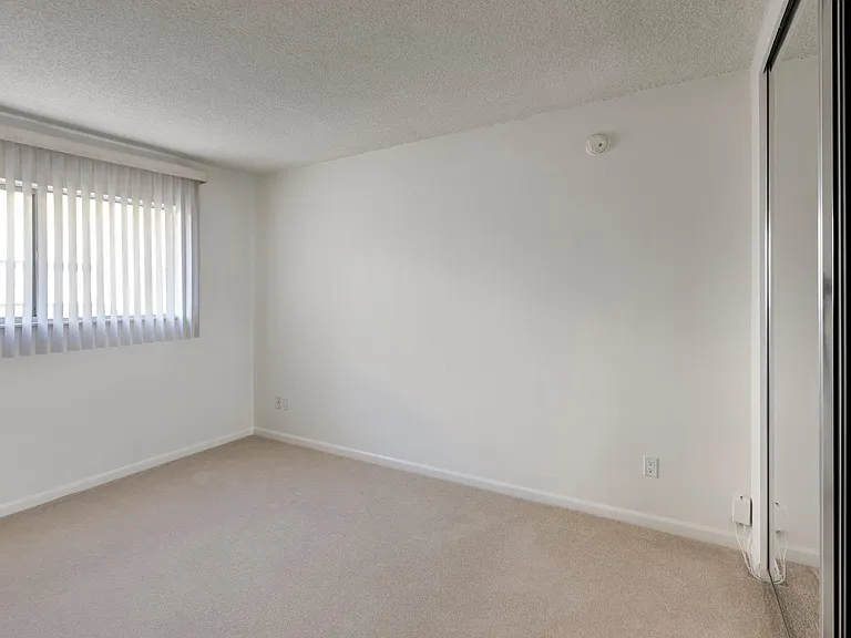 Apartments in West Los Angeles, CA Del Rio bedroom with vertical blind
