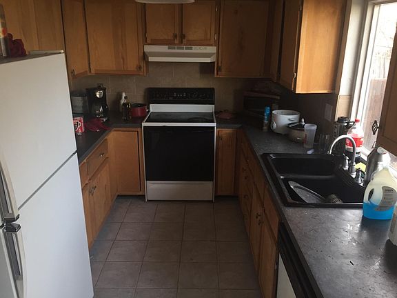 Kitchen includes maple cabinets, brand new super efficient dishwasher, glass top stove.