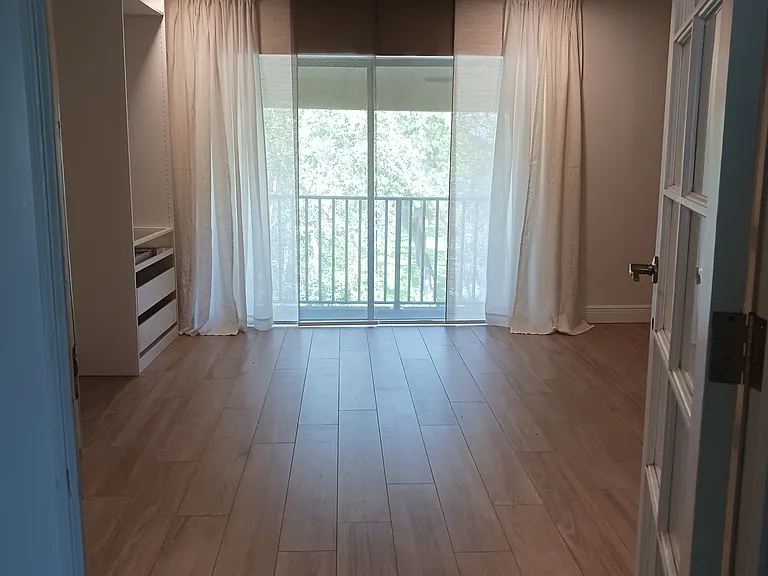 Master bedroom with balcony