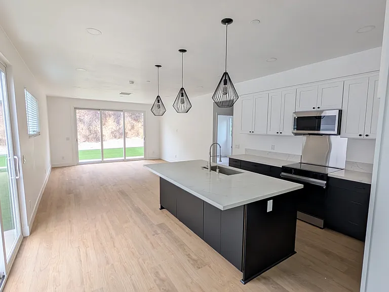 Open living room, kitchen area.