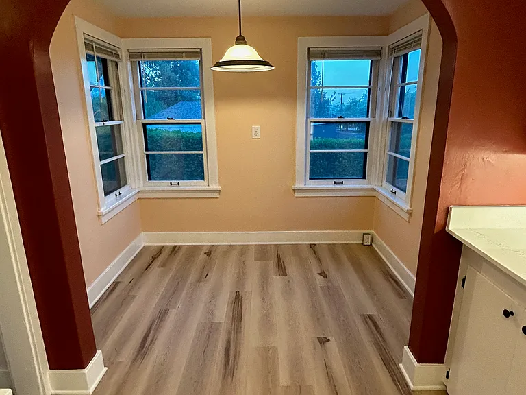 Cozy dining nook gets great natural light.