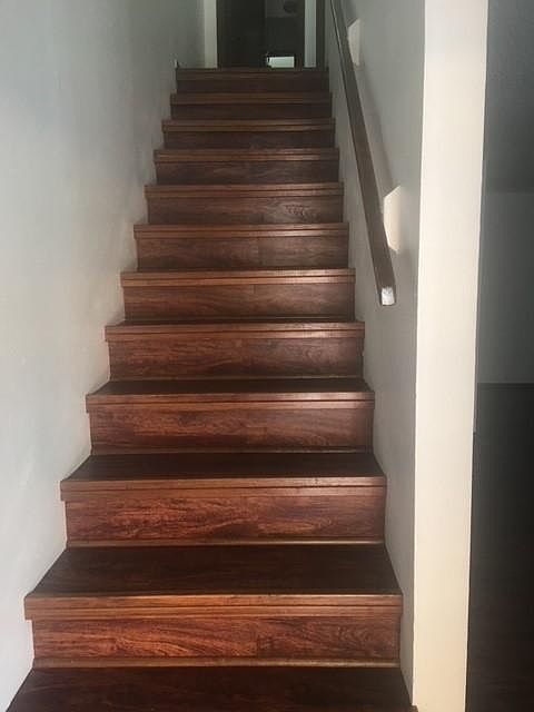 Staircase to bedroom and bathroom