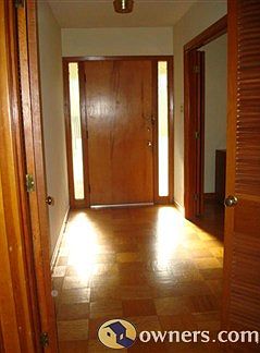 Foyer and Front Door view from Den doorway