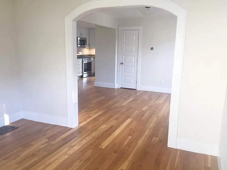 Living and dining room looking towards kitchen