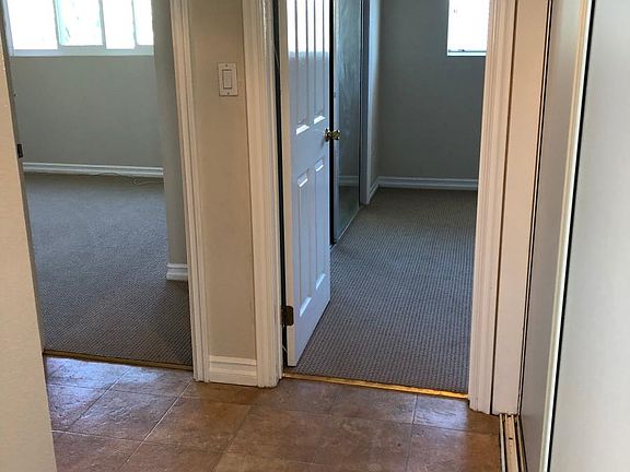 Hall to end rooms and bath