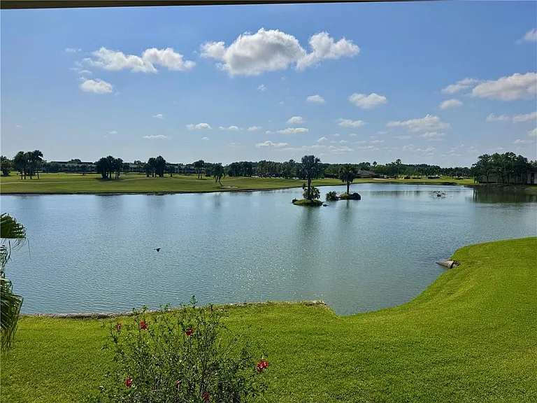 Enjoy STUNNING expansive lake & golf course views!
