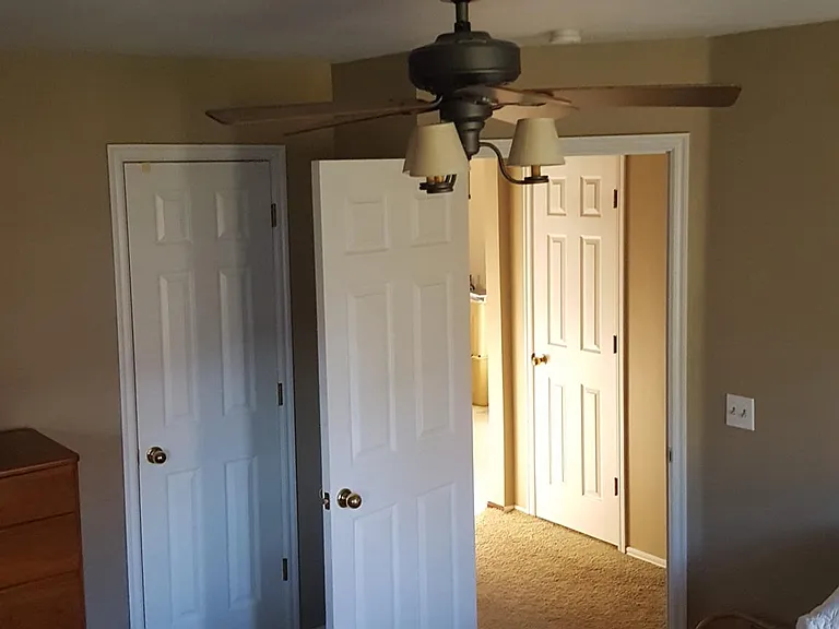 Guest bedroom and walk in closet West
