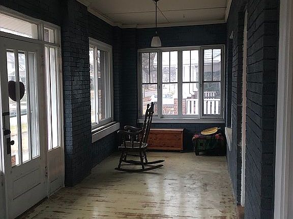 Enclosed front porch 